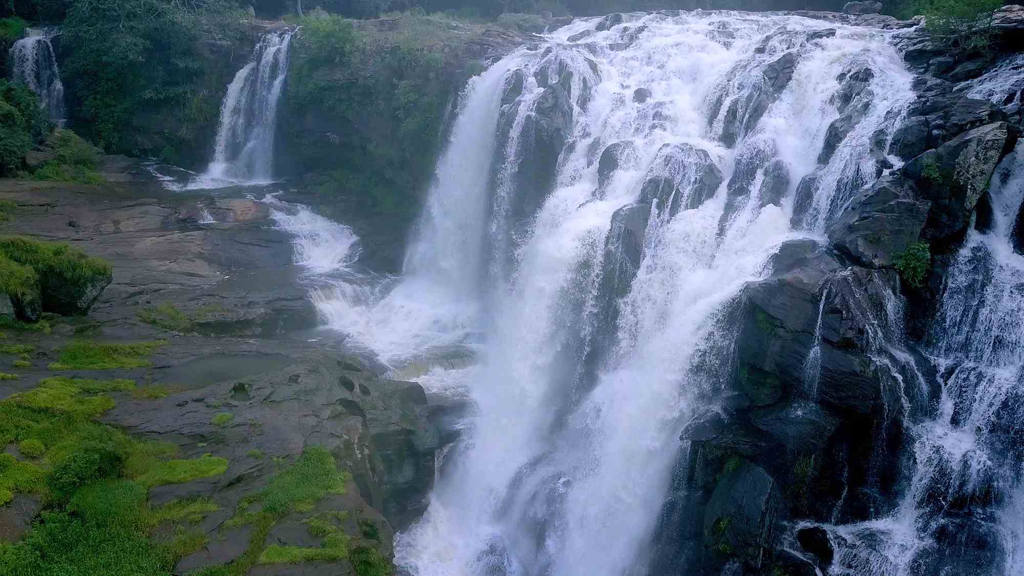 Thoovanam Waterfalls img